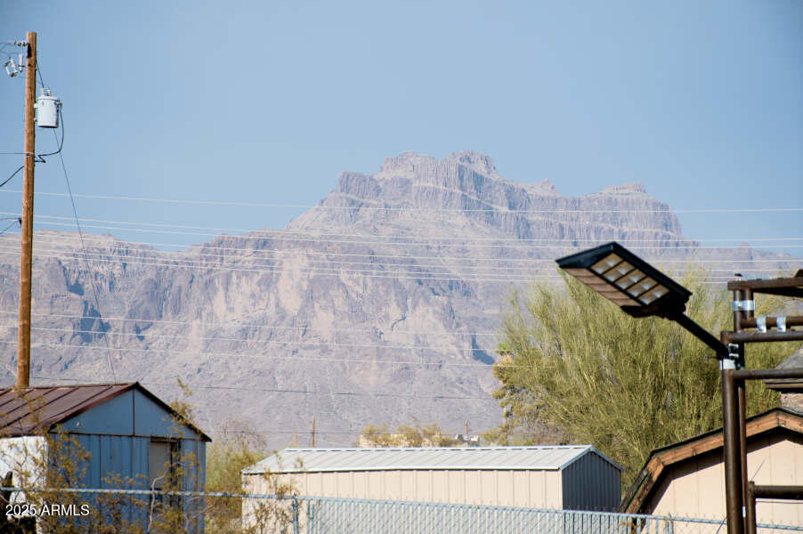 200 North Tomahawk Road Apache Junction, AZ 85119 - Photo 3 of 56 a view of staircase with wooden floor