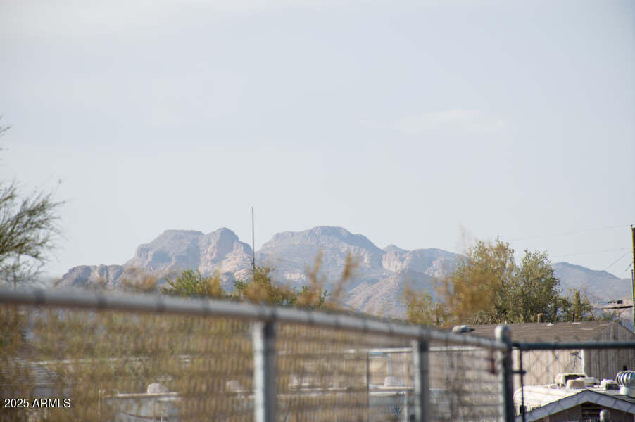 200 North Tomahawk Road Apache Junction, AZ 85119 - Photo 44 of 56 a view of ocean with a mountain in the background