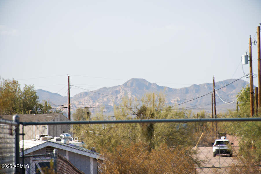 200 North Tomahawk Road Apache Junction, AZ 85119 - Photo 45 of 56 a view of a lake with a mountain