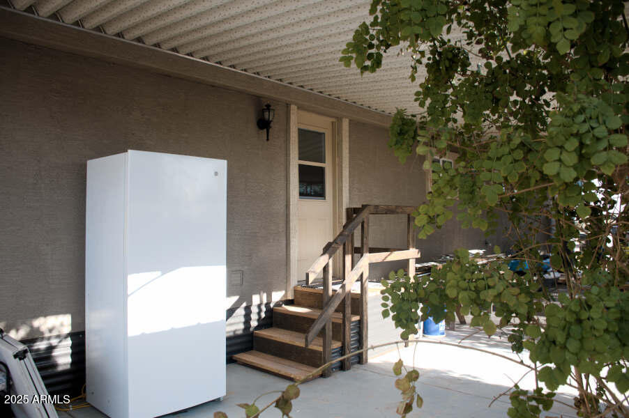 200 North Tomahawk Road Apache Junction, AZ 85119 - Photo 49 of 56 a front view of a house with outdoor seating