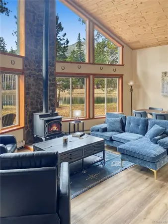 a view of a glass door and a yard