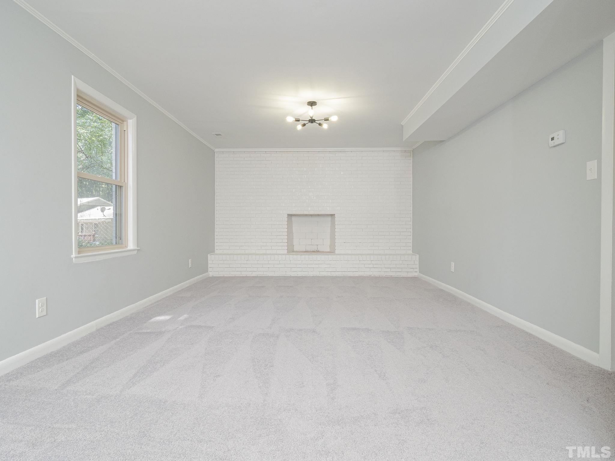 5309 Knollwood Road Raleigh, NC 27609 - Photo 14 of 19 an empty room with windows and closet