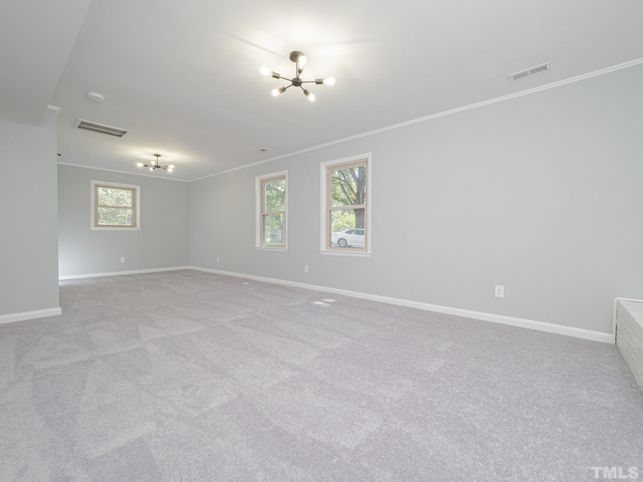 5309 Knollwood Road Raleigh, NC 27609 - Photo 15 of 19 a view of an empty room with a window