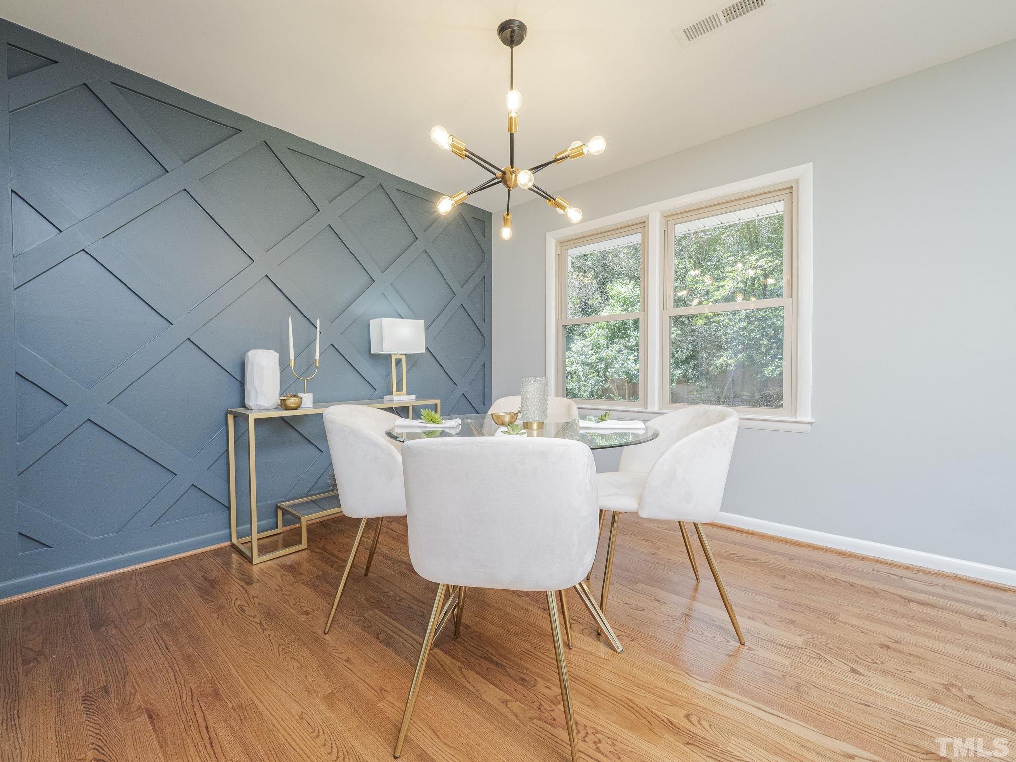 5309 Knollwood Road Raleigh, NC 27609 - Photo 8 of 19 a view of a dining room with furniture window and outside view