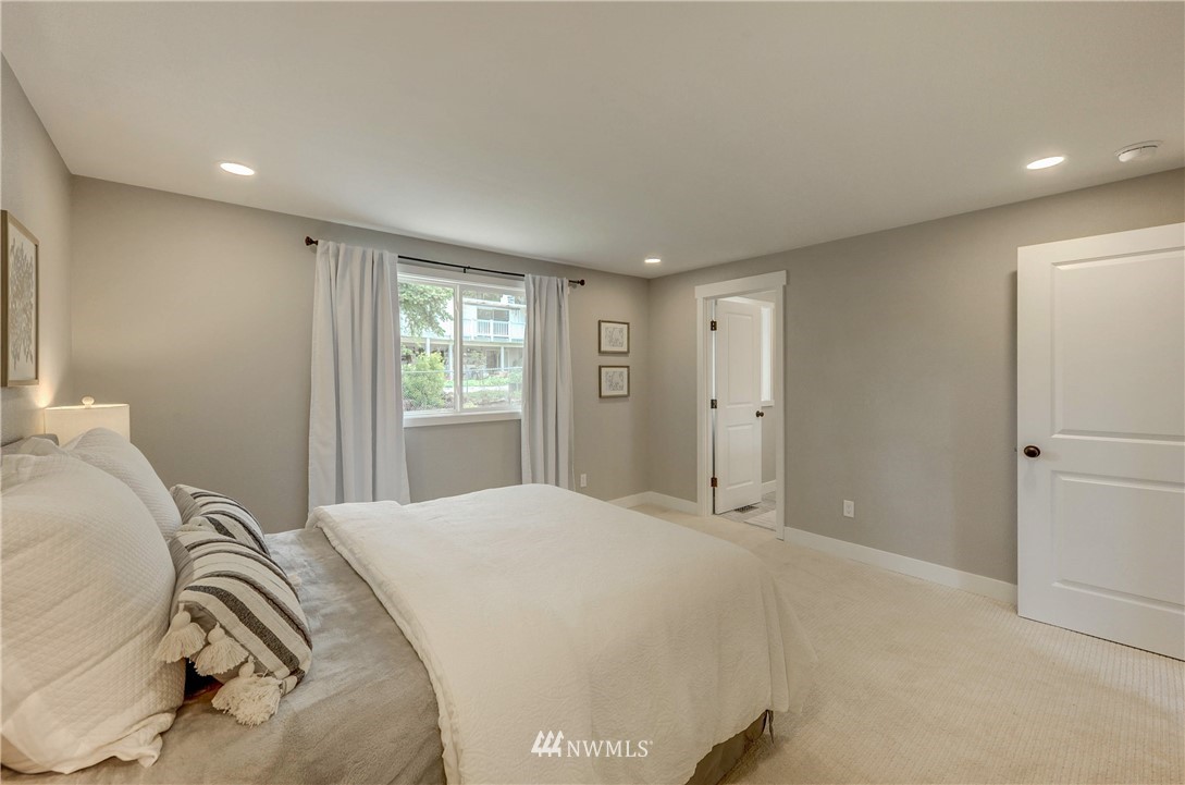 31 218th Place Southwest Bothell, WA 98021 - Photo 17 of 26 a bed room with a bed and a window