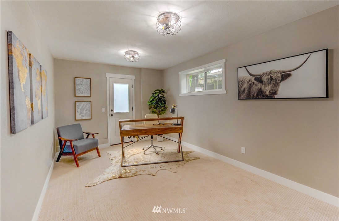 31 218th Place Southwest Bothell, WA 98021 - Photo 23 of 26 a living room with furniture and a potted plant