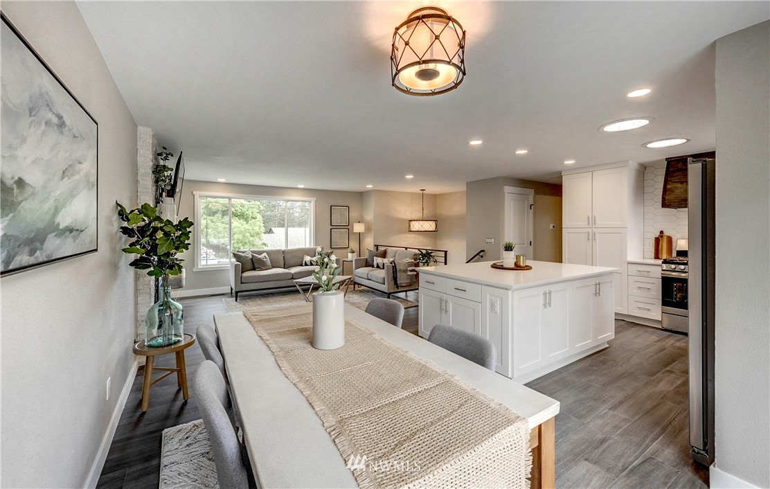 31 218th Place Southwest Bothell, WA 98021 - Photo 7 of 26 a view of kitchen with sink and living room