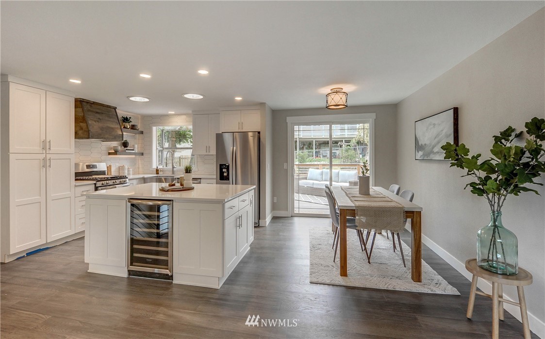 31 218th Place Southwest Bothell, WA 98021 - Photo 8 of 26 a kitchen with a table and chairs