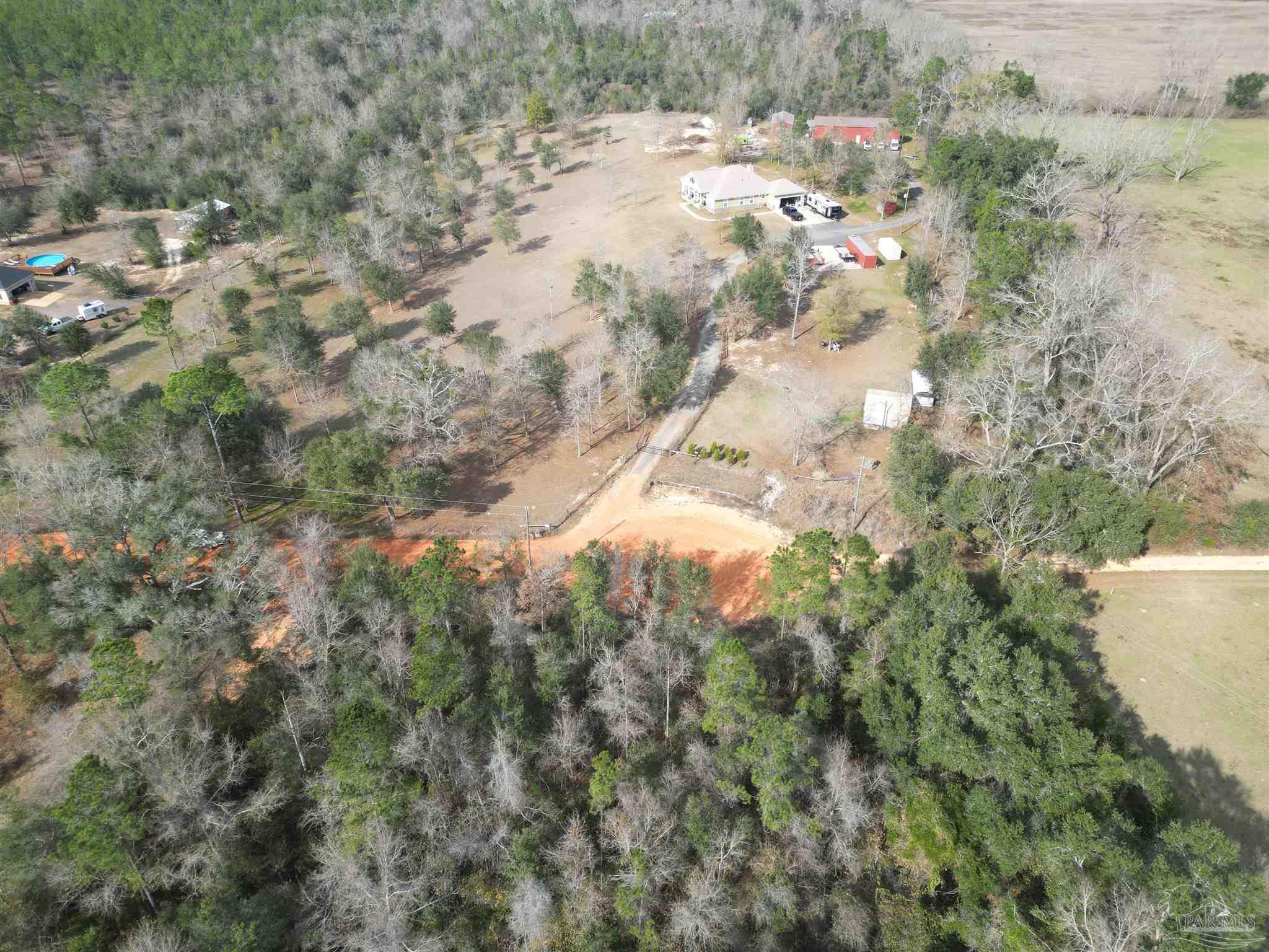 Lot 47 Arbor Ridge Road Pace, FL 32571 - Photo 6 of 8 a view of a yard of a house