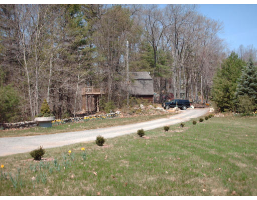 86 B Oxbow Road Charlton, MA 01507 - Photo 3 of 28 a view of swimming pool with a yard