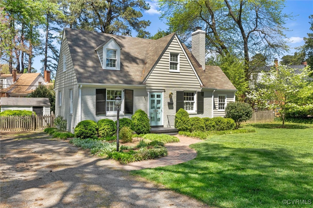 1210 Skipwith Road Henrico, VA 23229 - Photo 11 of 32 a front view of a house with a yard and porch