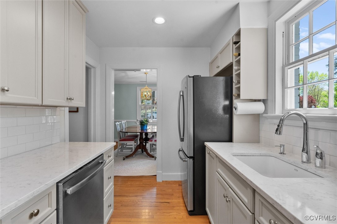 1210 Skipwith Road Henrico, VA 23229 - Photo 21 of 32 a kitchen with a sink appliances and cabinets