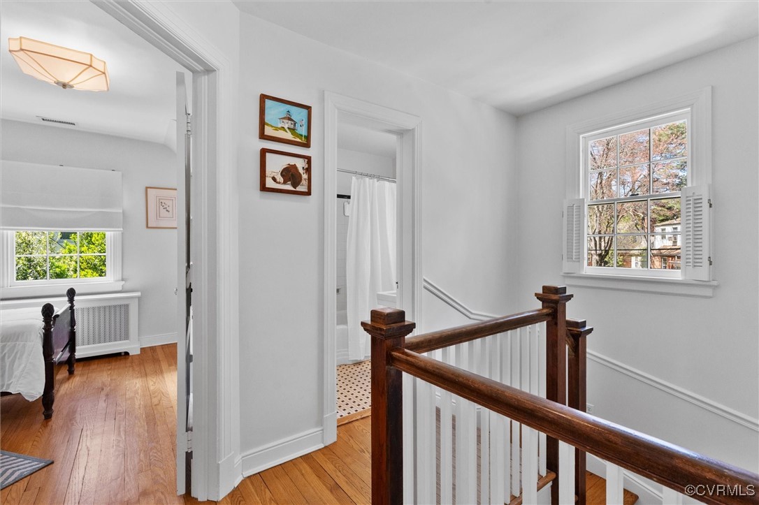 1210 Skipwith Road Henrico, VA 23229 - Photo 27 of 32 a view of a hallway with wooden floor and windows