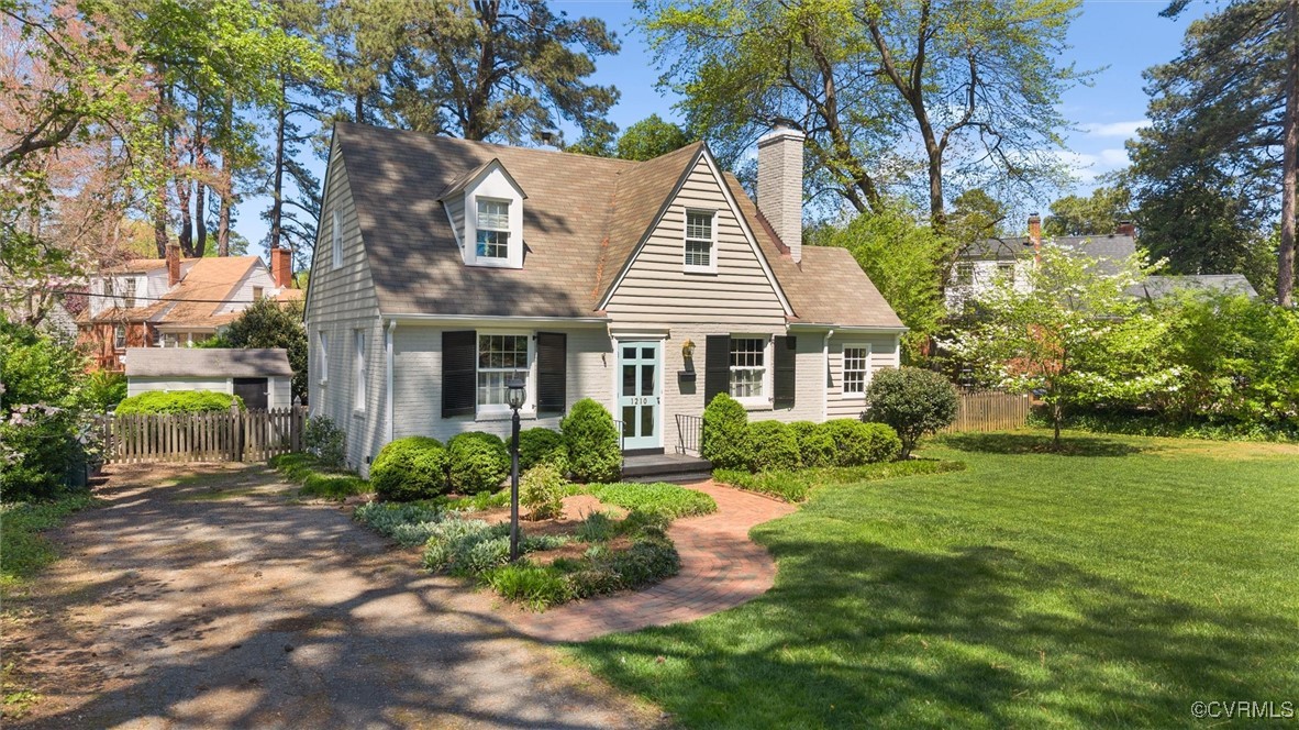 1210 Skipwith Road Henrico, VA 23229 - Photo 4 of 32 a front view of a house with garden