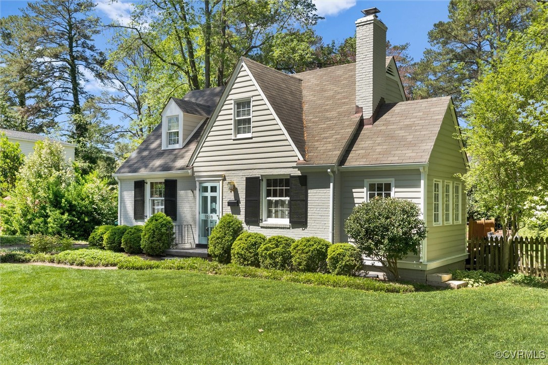 1210 Skipwith Road Henrico, VA 23229 - Photo 10 of 32 a view of a house with a yard and potted plants