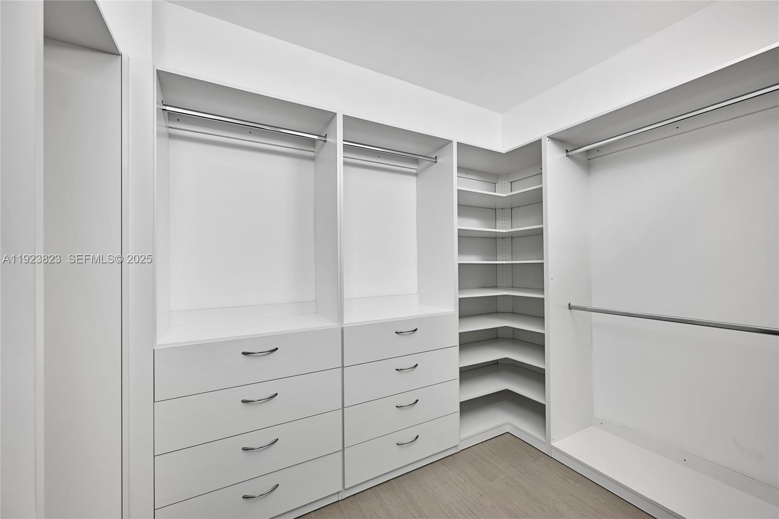 16445 Collins Avenue, Unit 2228 Sunny Isles Beach, FL 33160 - Photo 21 of 36 a view of an empty walk in closet