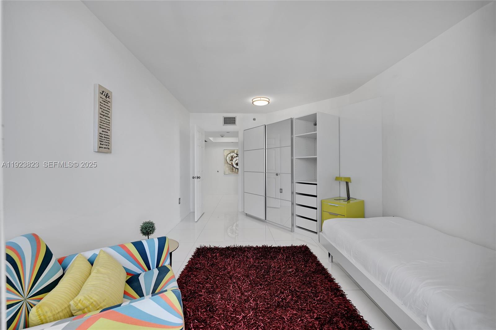 16445 Collins Avenue, Unit 2228 Sunny Isles Beach, FL 33160 - Photo 27 of 36 a bathroom with a bathtub and a shower