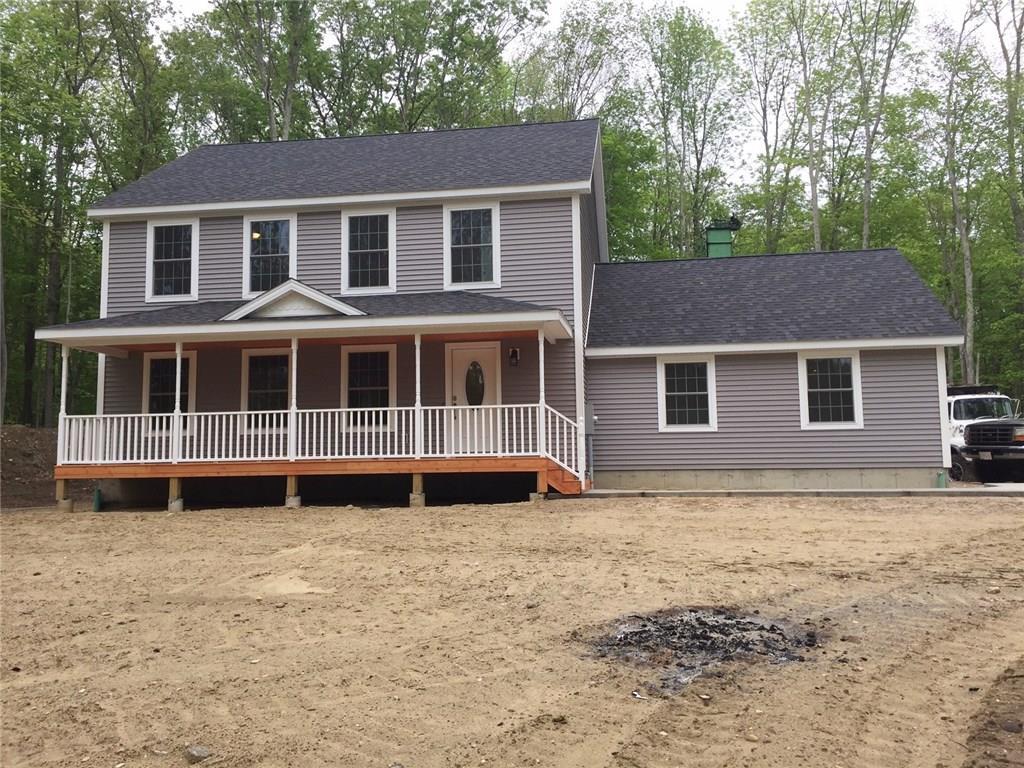302 Bingham Road Canterbury, CT 06331 - Photo 1 of 1 a house that has a large tree in front of it