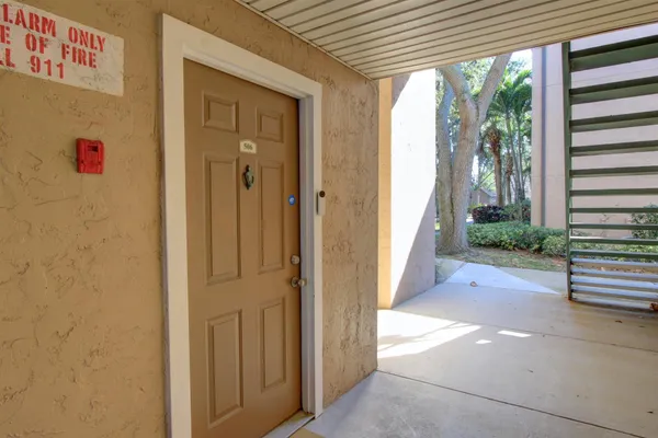 a view of a house with a street