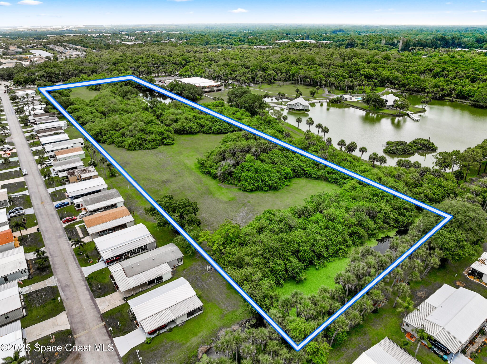 0 South John Rodes Boulevard Melbourne, FL 32934 - Photo 13 of 14 a view of swimming pool with a balcony