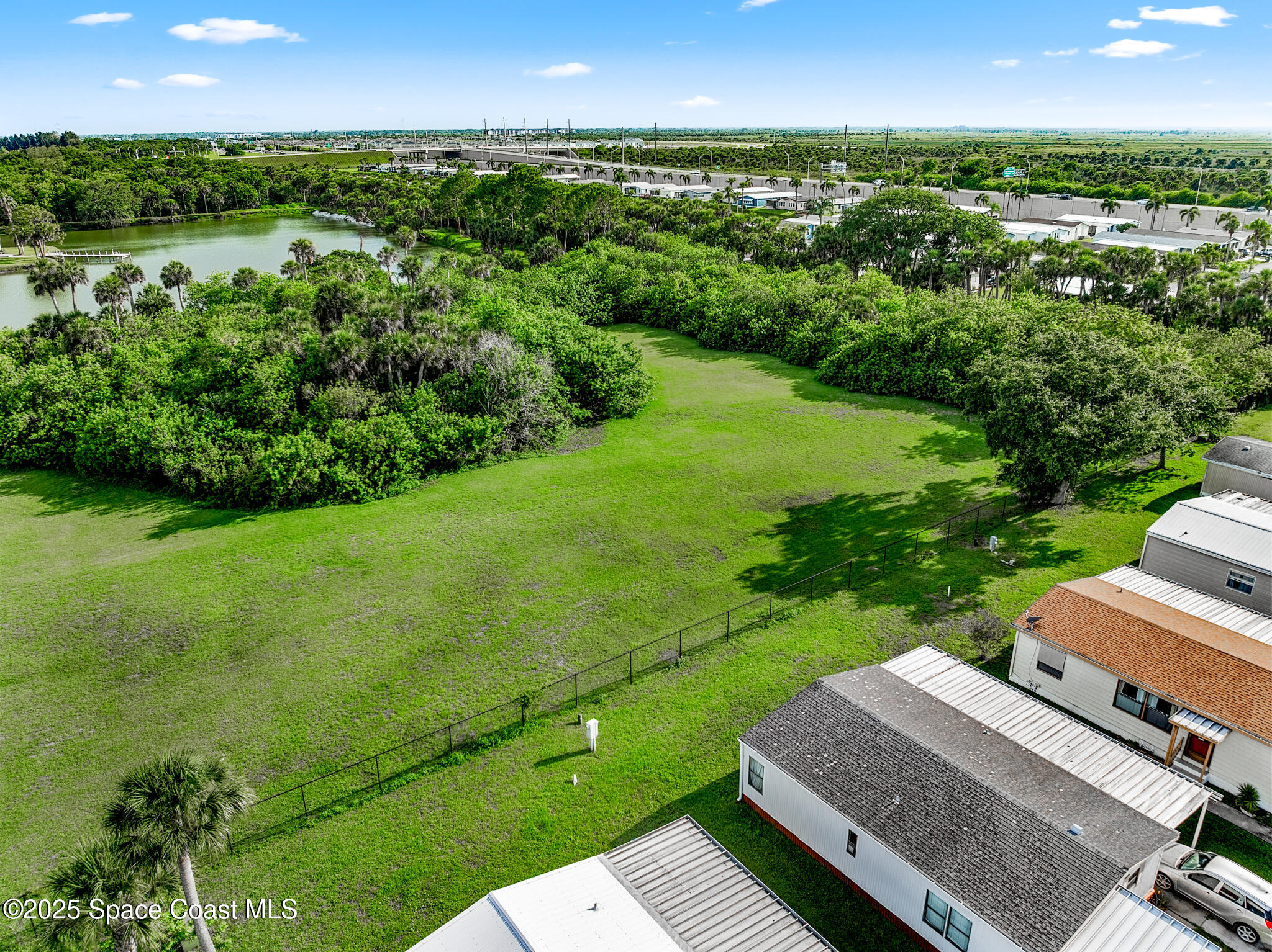 0 South John Rodes Boulevard Melbourne, FL 32934 - Photo 8 of 14 a view of a city from a garden