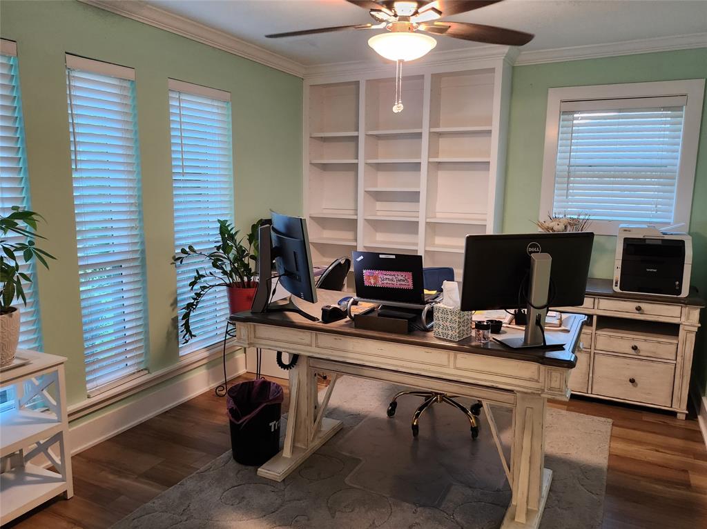 1023 Ridgefield Drive Plano, TX 75075 - Photo 6 of 39 a view of a workspace with furniture and a window
