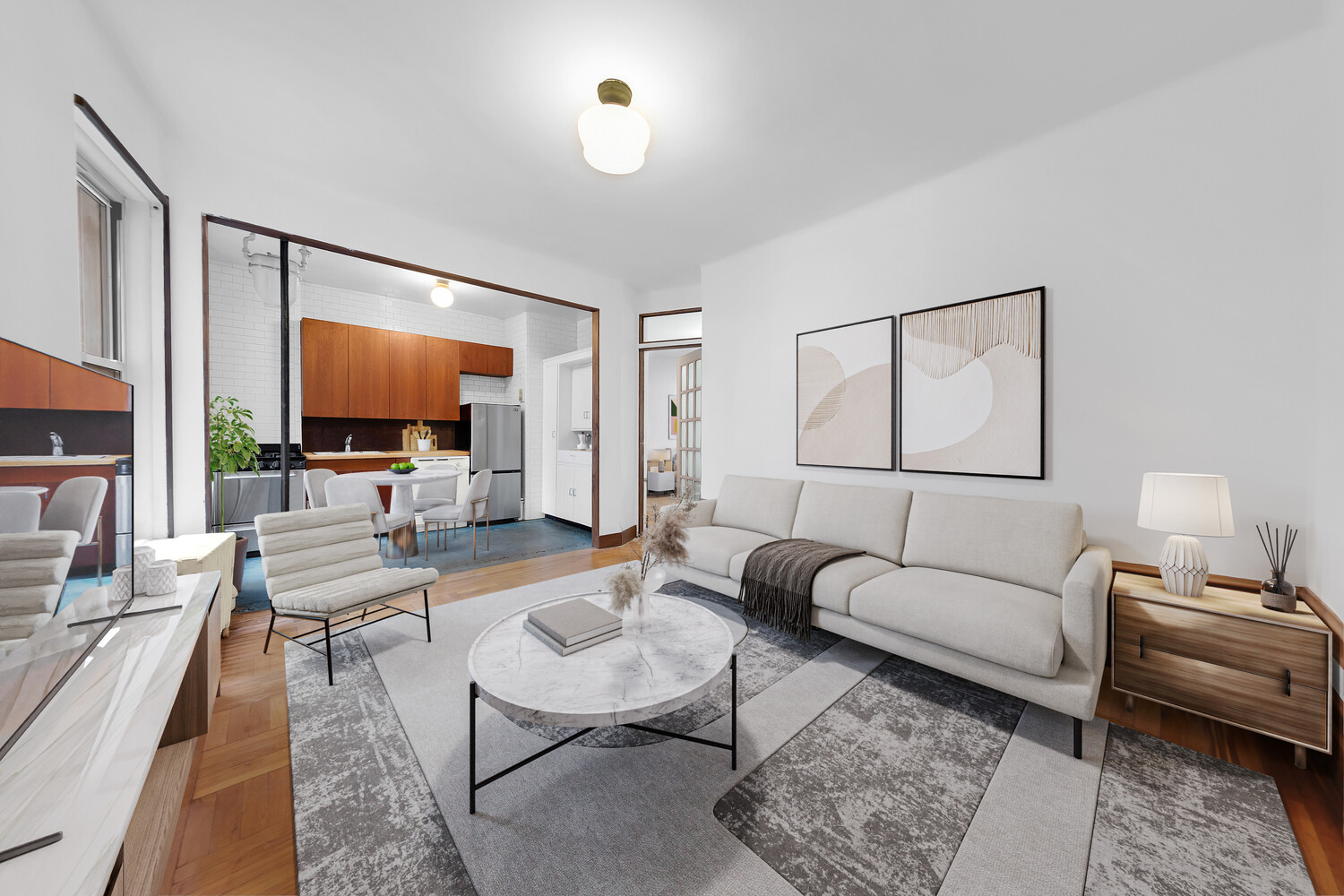 a living room with furniture and a flat screen tv