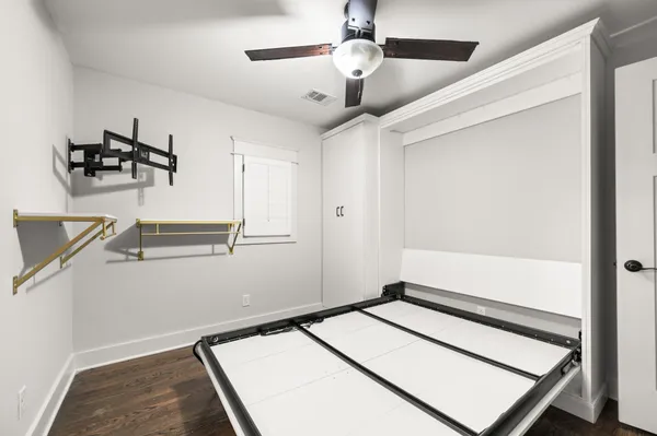 a bathroom with a sink a glass door shower and a mirror