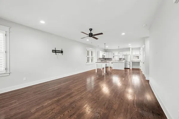 a view of livingroom and hardwood floor