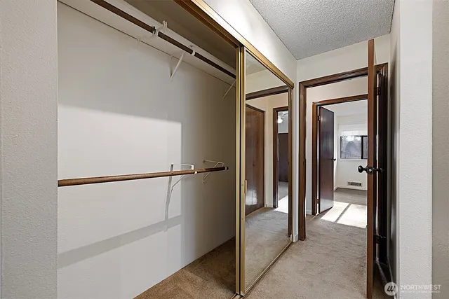 an empty room with a bathroom