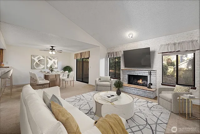 an empty room with fireplace and windows