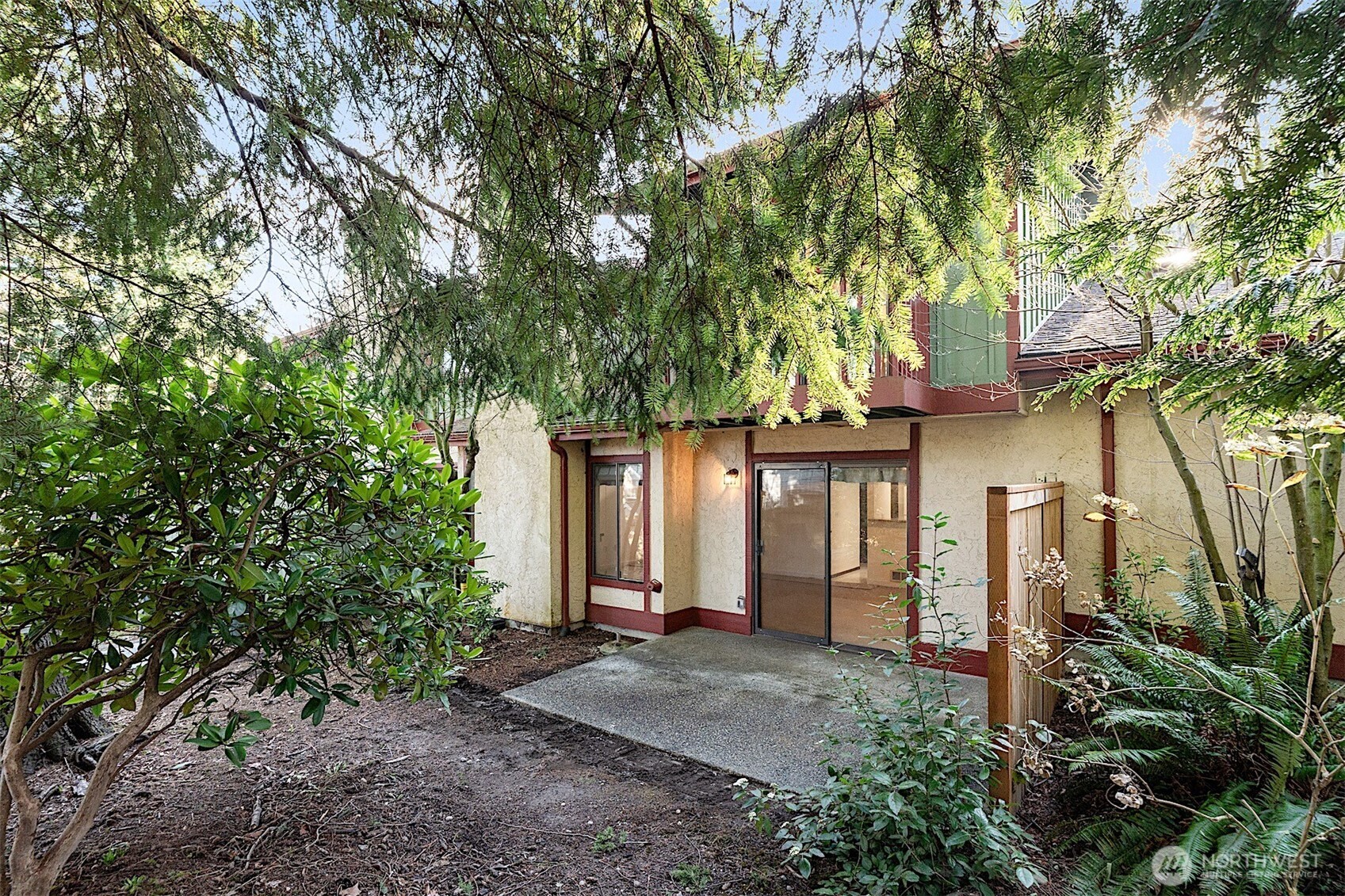 4724 Southwest 317th Lane, Unit B Federal Way, WA 98023 - Photo 32 of 40 a front view of a house with yard and trees