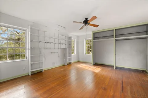 a view of a trees in front of a house