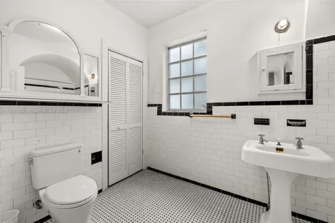 a view of water with a building in the background