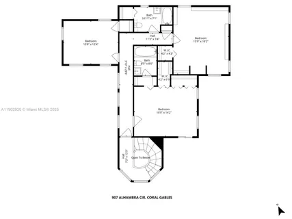 a view of an empty room with wooden floor and a mirror