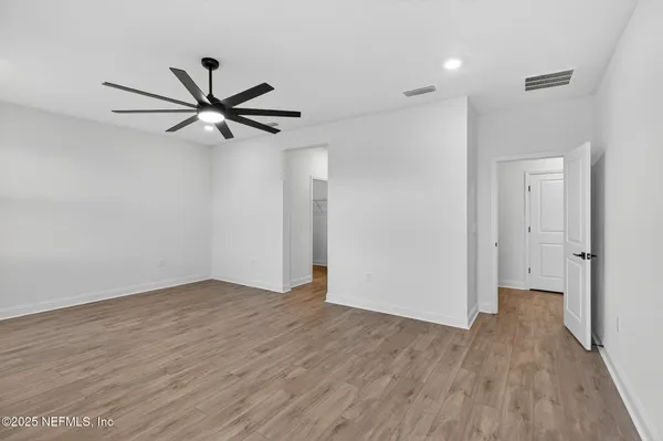 a view of a small space with racks on the wall