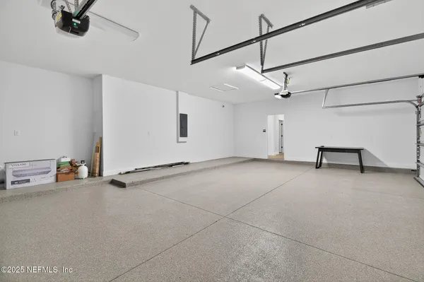 a view of a large yard with an ocean view