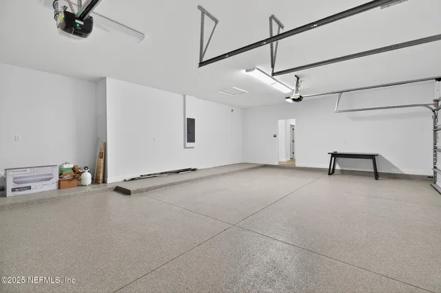 a view of a large yard with an ocean view