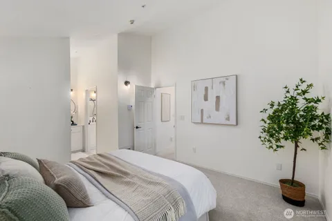 a bathroom with a sink a mirror and vanity