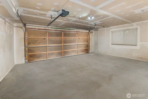 a view of two chairs in patio