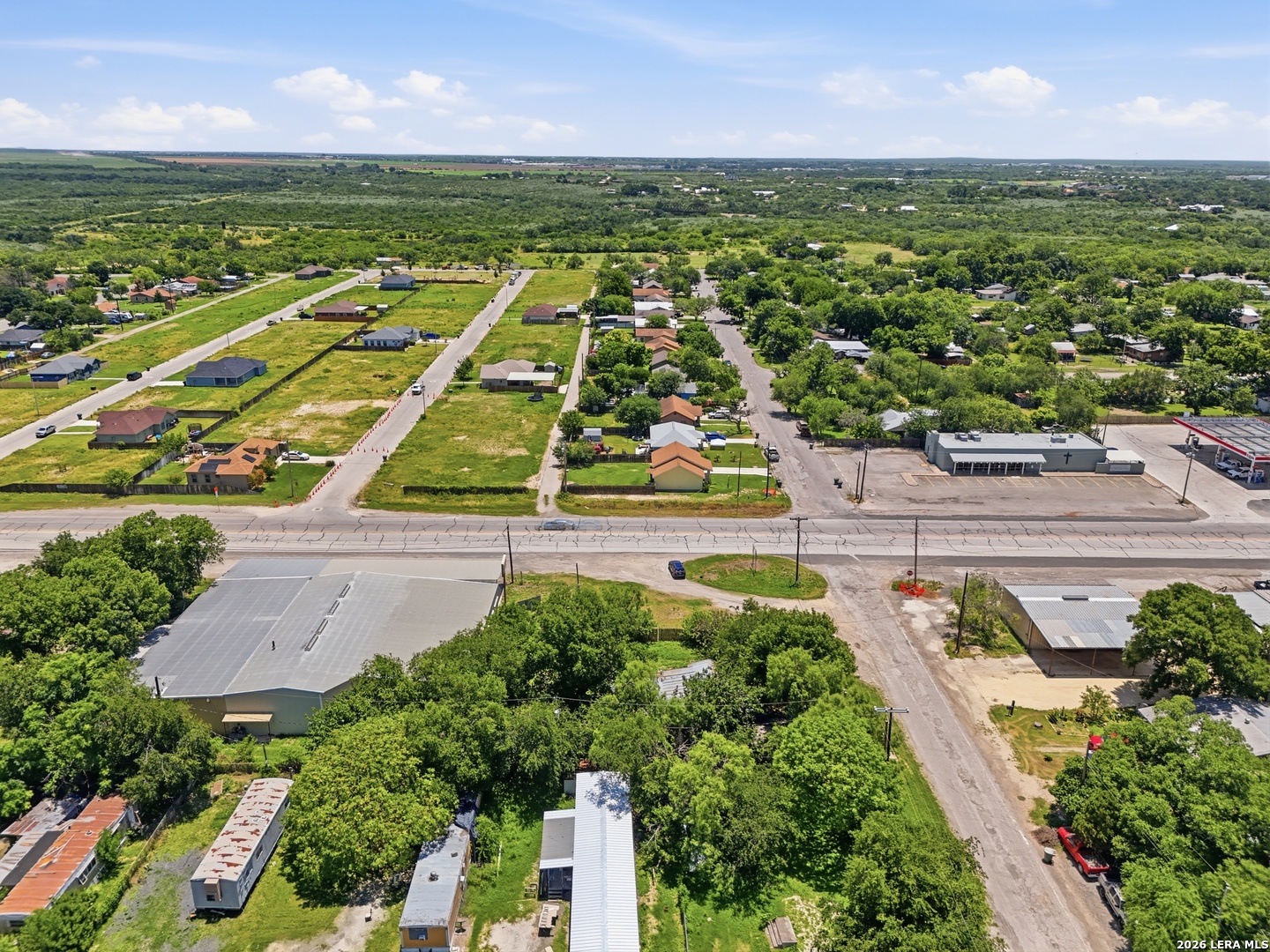 312 East Brazos Street Uvalde, TX 78801 - Photo 4 of 7 an aerial view of a city with lots of residential buildings