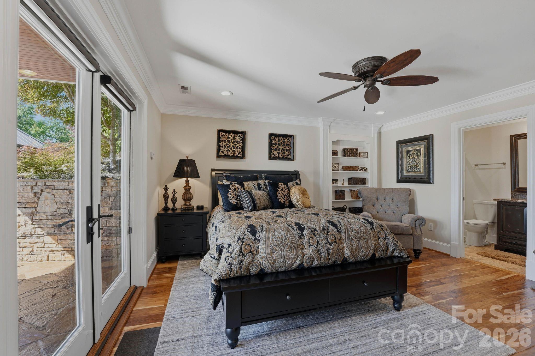 605 Recore Rdg Road Bessemer City, NC 28016 - Photo 24 of 47 a spacious bedroom with a bed and wooden floor