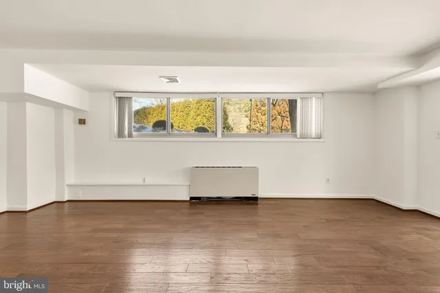 a view of room with hardwood floor