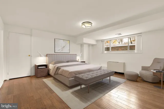 a bedroom with a bed and furniture