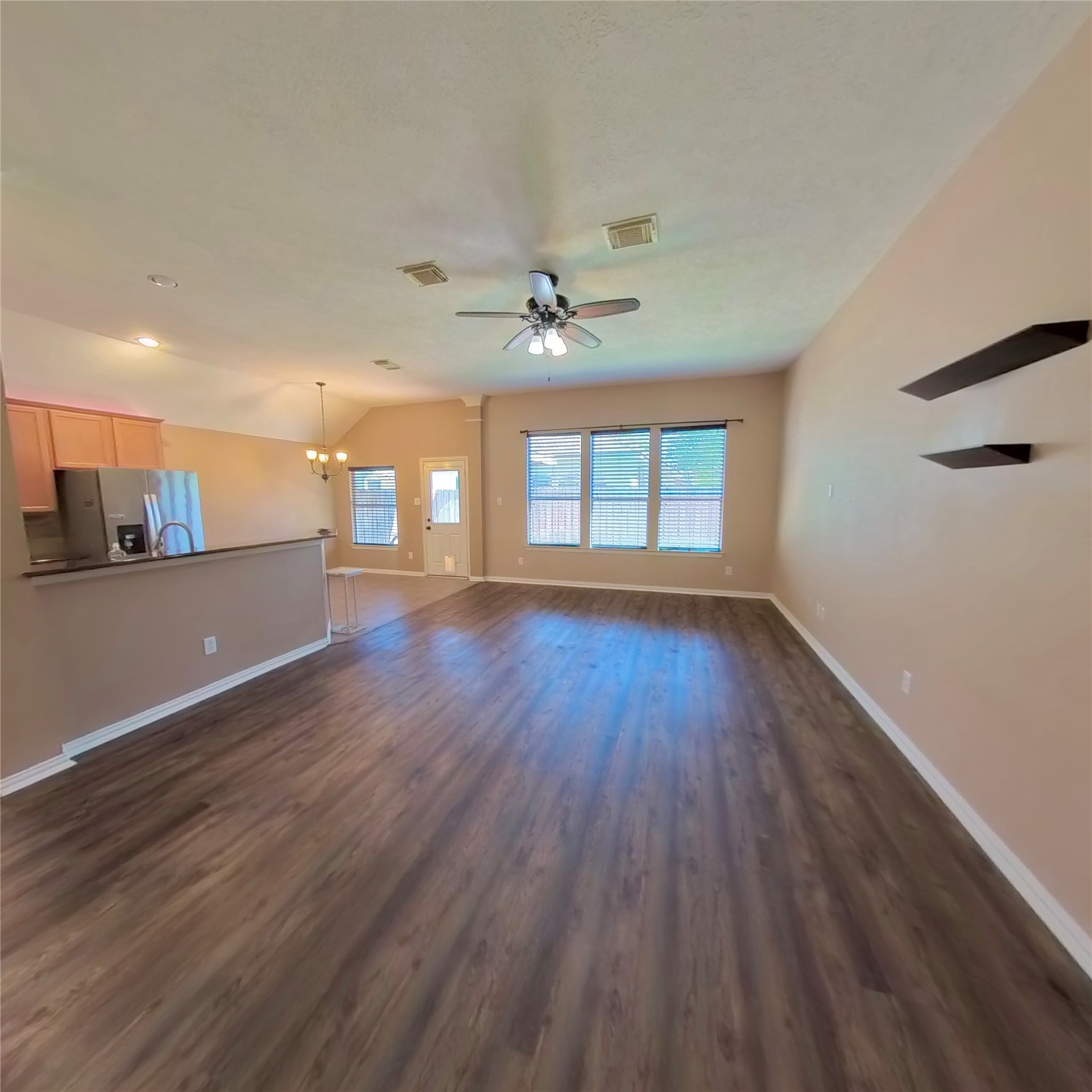 30938 Blue Ridge Park Lane Spring, TX 77386 - Photo 20 of 32 a view of an empty room with a window and wooden floor