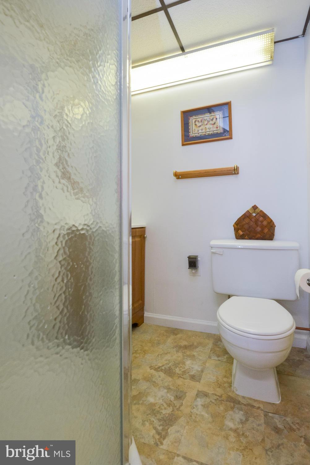 1927 Grant Road Halethorpe, MD 21227 - Photo 14 of 29 a bathroom with a toilet and a shower