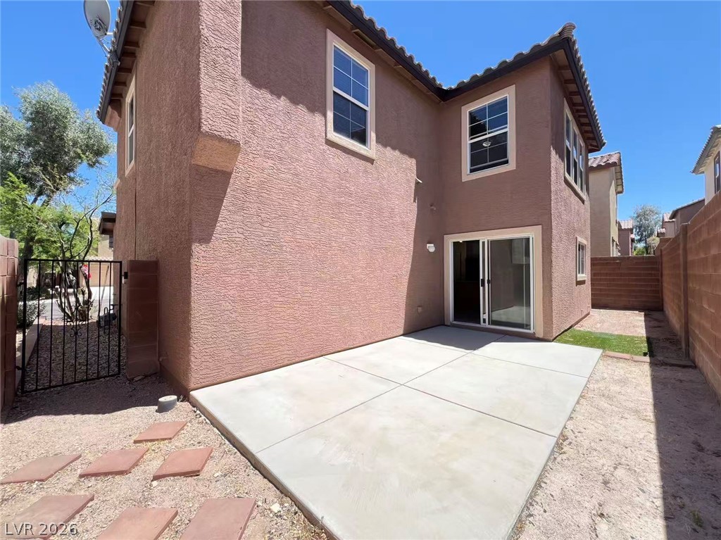 11143 Ranch Valley Street Las Vegas, NV 89179 - Photo 23 of 23 A spacious backyard patio with direct access to the home, ideal for outdoor entertaining.