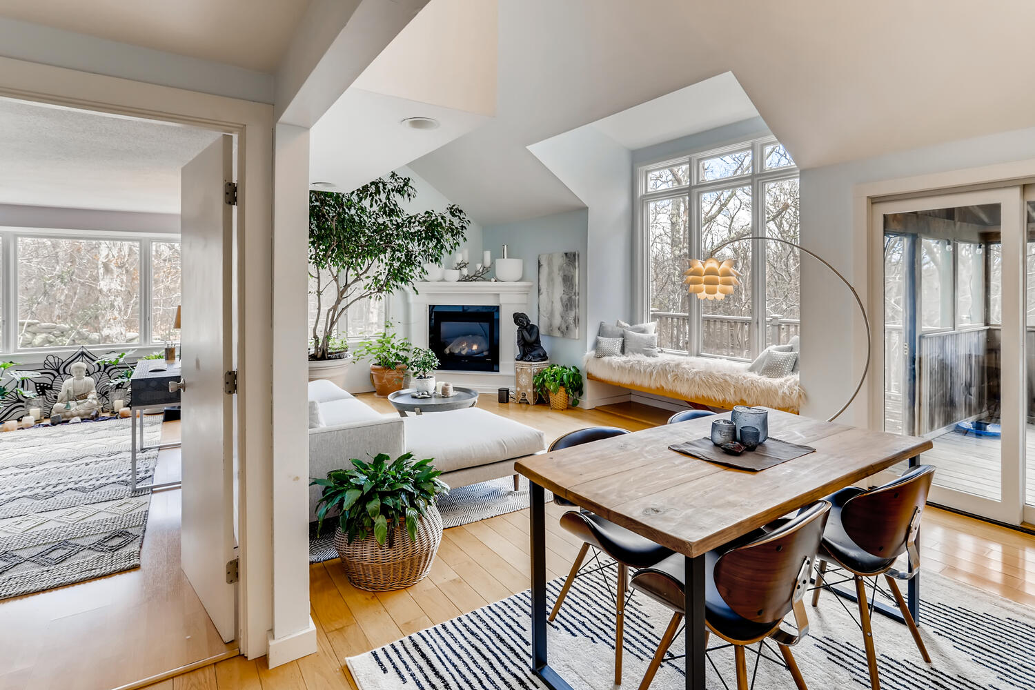 3 Fulling Mill Road Chilmark, MA 02535 - Photo 14 of 48 a view of a dining room with furniture and a potted plant