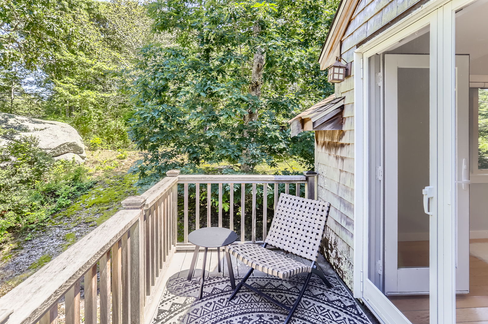 3 Fulling Mill Road Chilmark, MA 02535 - Photo 31 of 48 a view of a chair and table in the balcony