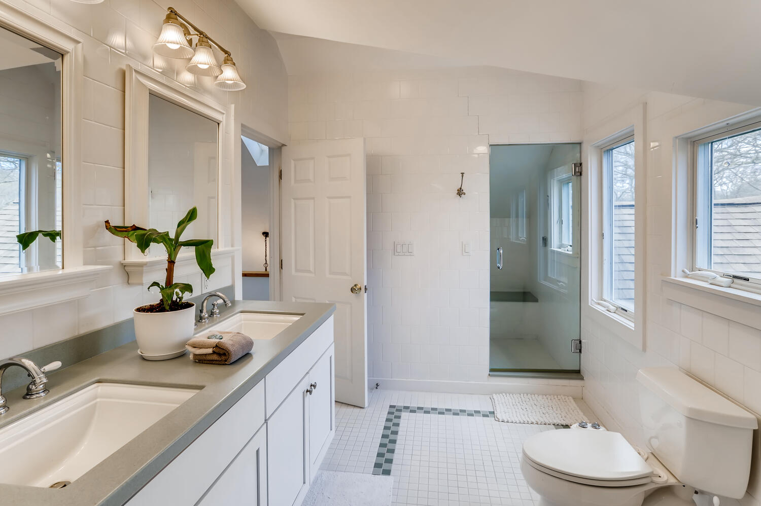 3 Fulling Mill Road Chilmark, MA 02535 - Photo 34 of 48 a bathroom with a granite countertop sink mirror vanity and toilet